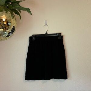 Black Skirt with pockets, estimated size M, elastic waistband